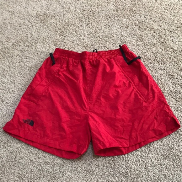 The north face woman’s large red water resistant shorts . - Picture 1 of 7